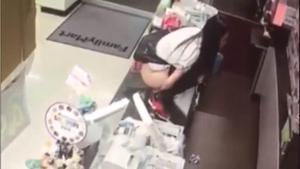 Girl Pees On Stall In a Shop