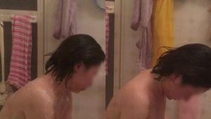 15382167 Video work showing a girl with small breasts taking a bath