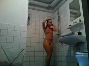 nice-blonde-girl-taking-a-shower-hidden-cam