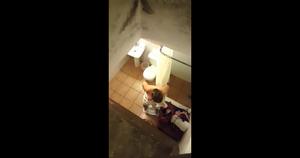 Women Hovering Over the Toilet