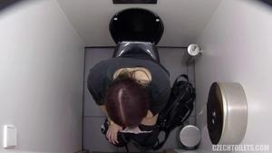 Sexy lady in long dress spied in toilet