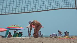 girls playing beach volley ball