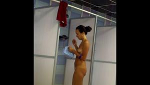 Voyeur peeps on girls showering in locker room