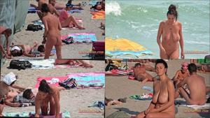 Big breasts at the beach