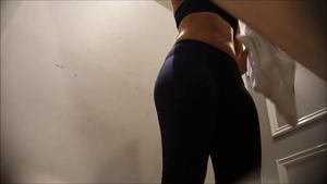 Spying on tight ass and nice tits of a sporty girl