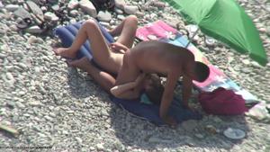 Kissing and fucking on a beach