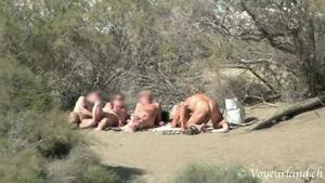 Nudist swingers caught by a voyeur