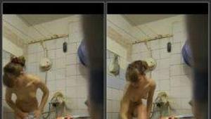 Spying on stepsister’s lovely tits in shower