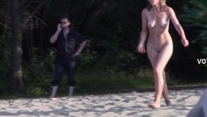 Sporty milf enjoys sports on the nudist beach