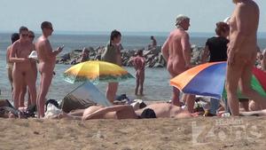 Hot naked milf on a beach