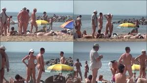 Hot naked milf on a beach
