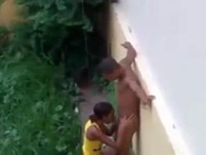 Hot standing sex outside by the wall