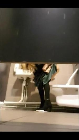 Hot ass and shaved pussy caught in public toilet