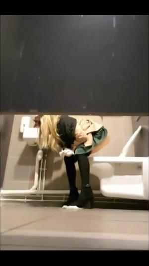 Hot ass and shaved pussy caught in public toilet