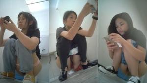 Attractive woman climbs the toilet to pee 02