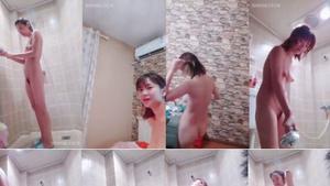 Petite asian washing teeth and showering