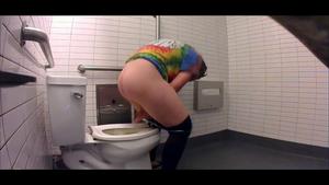 Fit jogger caught peeing in public toilet