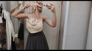 Trying new dresses on naked body
