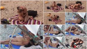 Horny couple on the beach