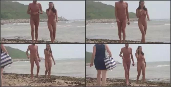 Passing by a nude girl on beach