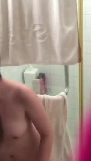 Spying on sweet girl washing her pussy in shower