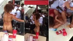 Female Lets It All Hang Out On South Beach & Gets Ketchup Poured On Her