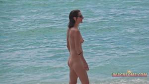 Hot girl on a nudist beach