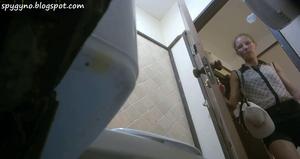 Peeping on naked ass of a coworker on the toilet