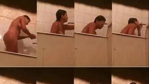 Spying a naked busty girl wash herself in bathroom