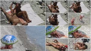 Voyeur busted while filming beach sex behind rocks