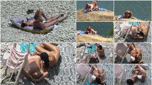 Horny couple on a nudist beach