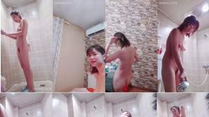 Petite asian washing teeth and showering