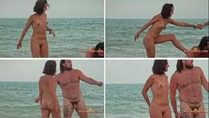 Amazing nudist woman shows flexibility on beach