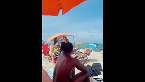Voyeur checks out nudist friends on the beach 02